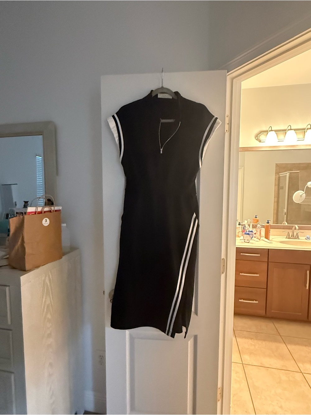 Black Sleeveless Zip-Front Sport Dress with White Trim